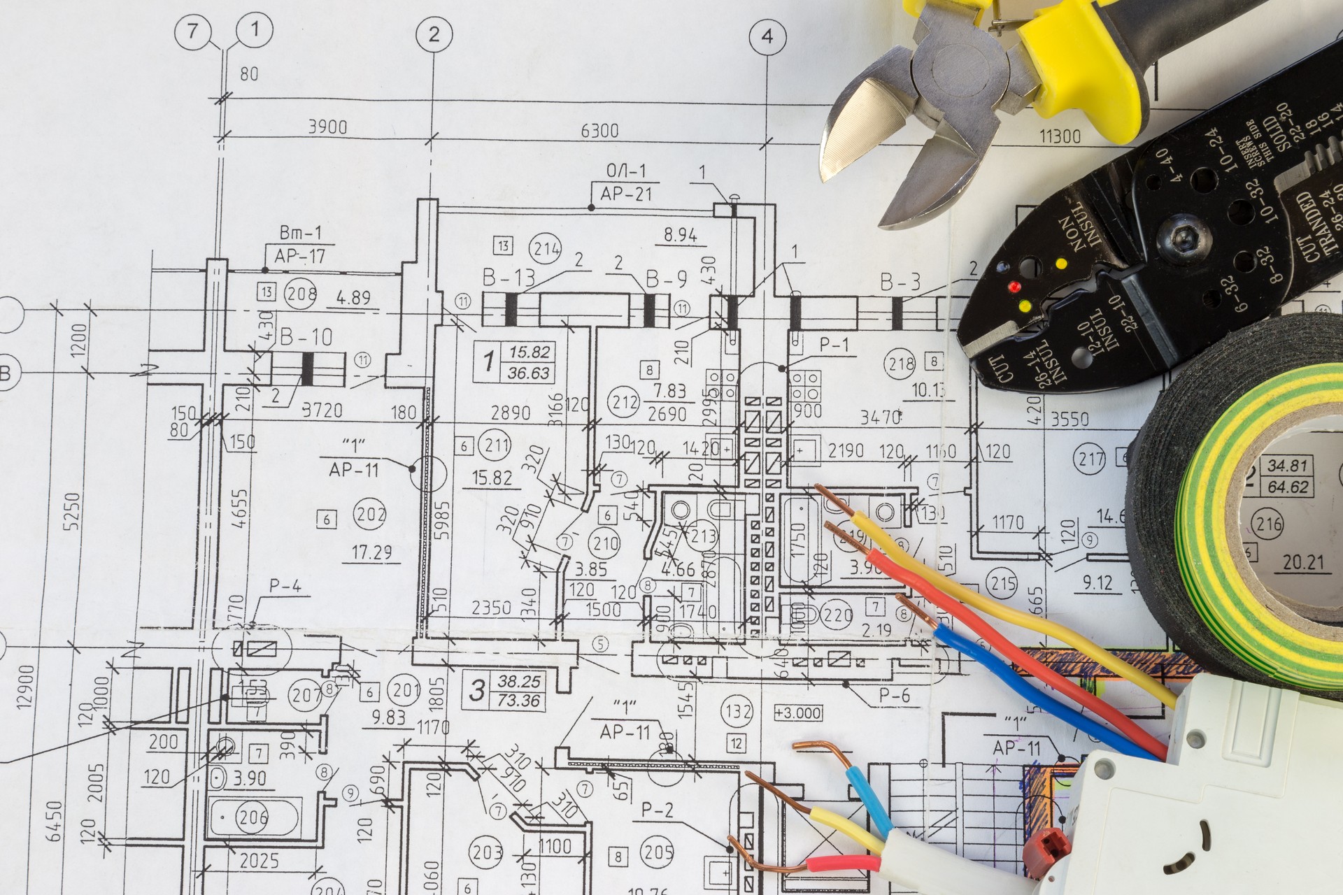 Still Life Of Electrical Components Arranged On Plans